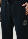 Jersey Trousers With Heraldic Patch