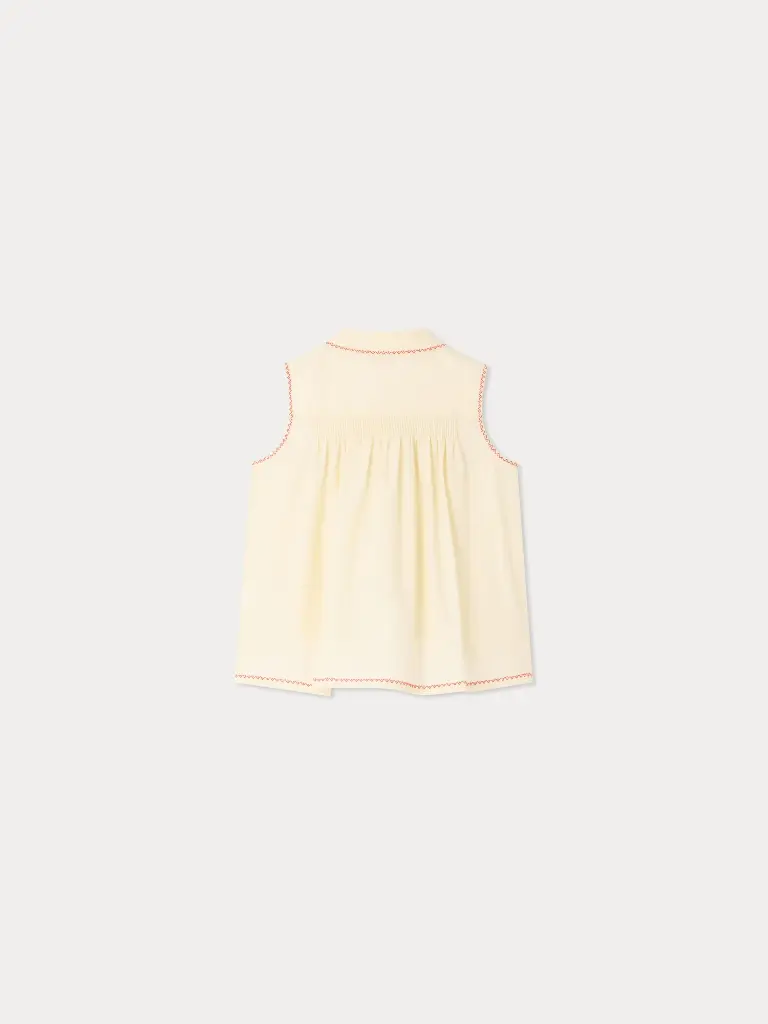 Lexi smocked and hand-embroidered blouse in organic cotton