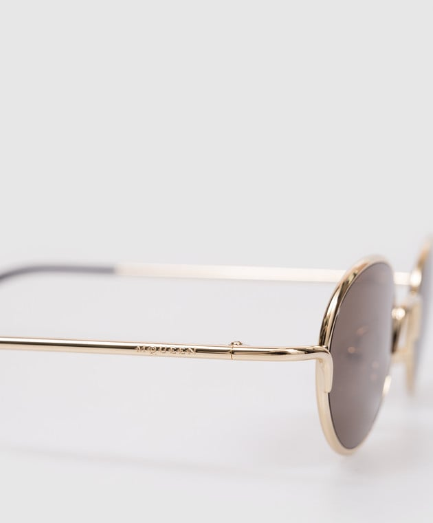 Gold sunglasses with logo engraving